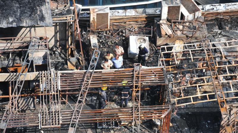 14 people were charred to death when a massive fire broke out at Kamala Mills Compound on Dec 29, 2017. (Photo: Debasish Dey)
