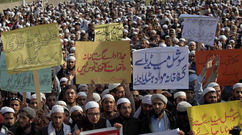 Pakistani students of Islamic seminaries take part in a rally in support of blasphemy laws, in Islamabad, Pakistan. (Photo: AP)