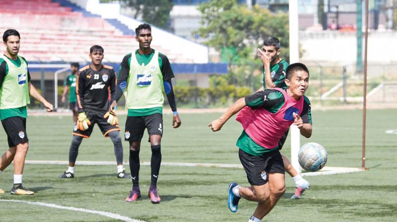 Bengaluru FC players at a practice session on Thursday.