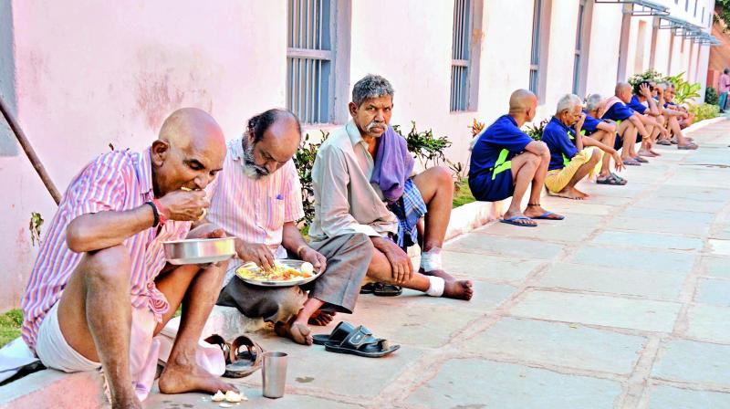 Beggars at Anand Ashram in Chanchalguda being served the mid-day meal on Friday.  (Photo: DC)
