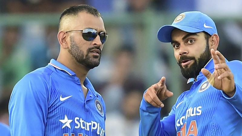 Virat Kohli believes that the 24 limited-over matches at home will help the former skipper MS Dhoni in getting some momentum and consistency going his way. (Photo: PTI)