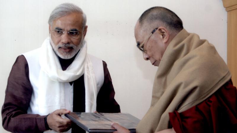 Prime Minister Narendra Modi with Tibetan spiritual leader the Dalai Lama in 2013 (Photo: narendramodi.in)