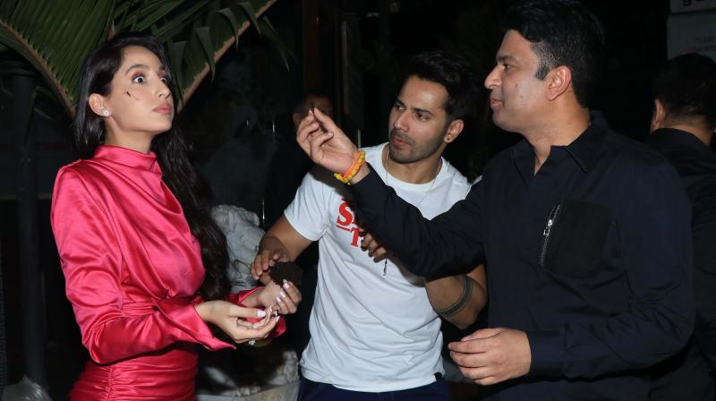 Nora Fatehi who turned a year older celebrated her birthday with Street Dancer co-star Varun Dhawan, filmmaker Bhushan Kumar and others.