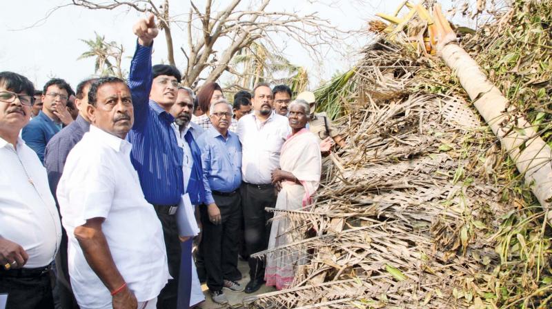 Senior IAS officer Dr J. Radhakrishnan explaining the destruction caused by Cyclone Gaja to the Central team during its visit to the worst-hit Vedaranyam region of Nagapattinam district on Monday. (Photo: DC)