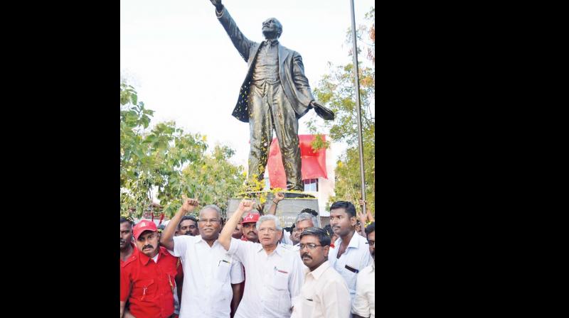 CPM national general secretary, Sitaram Yechuri along with the Tamil Nadu state secretary of CPM, Balarishnan after unveiling the 12-ft Lenin statue in Tirunelveli on Tuesday. (Photo: M. Arul Oli)