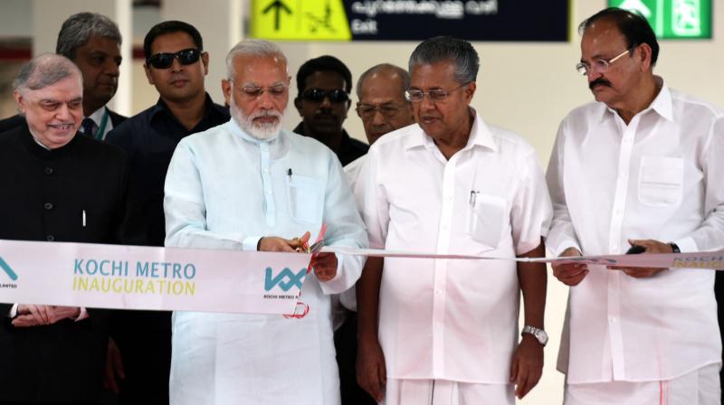 In pics: Modi flags off first phase of Kochi Metro, enjoys his debut ride