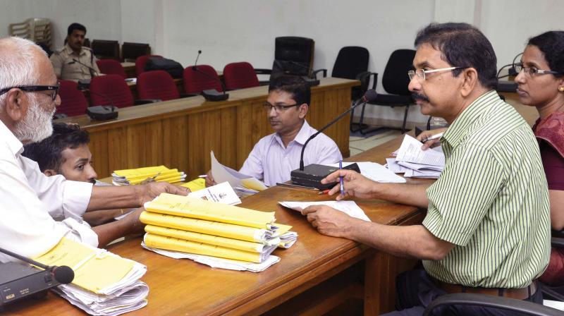 State minority commission chairman Justice (ret) P.K Haneefa at the commission Adalat at Kozhikode Collectorate on Saturday.