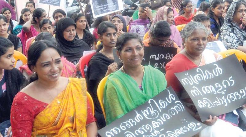 Women gathered in front of Palayam market as part of the protest organized by the collective #IWillGoOut against violence on women. (Photo: DC)