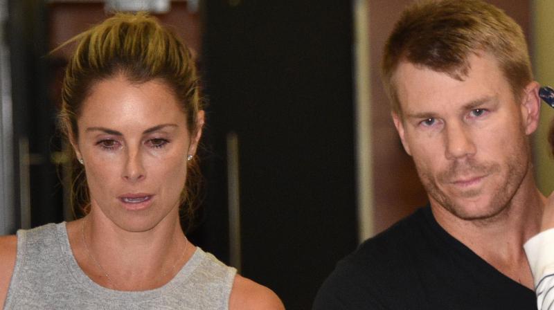In a tearful press conference in Sydney on Saturday, the 31-year-old David Warner spoke of his fear that he would never get to represent Australia again as his wife Candice Warner watched on. (Photo: AFP)