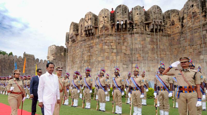 Chief Minister K. Chandrasekhar Rao reviews the parade during the I-Day celebrations at the Golconda fort in Hyderabad on Tuesday.