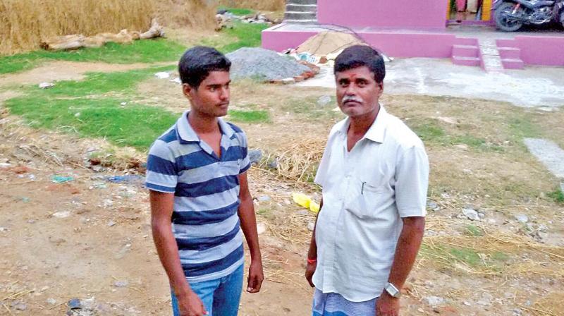 Jai Sunil with his father Babu.	(Photo: DC)