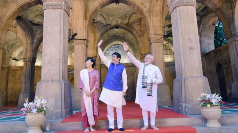 Modi, Japanese PM Shinzo Abe and his wife Akie Abe at Sidi Saiyyid Ni Jaali, the famous 16th century mosque in Ahmedabad. (Photo : ANI | Twitter)
