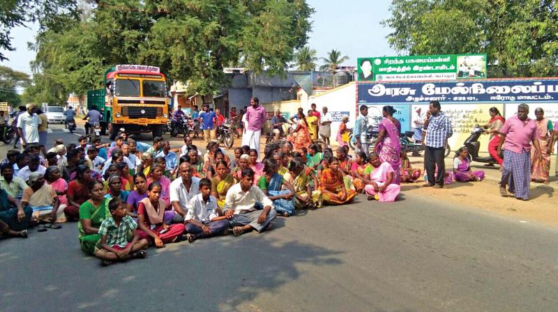 Relatives of plus 2 student who committed suicide a few days ago lay siege to the GHSS at Salem, demanding the arrest of the teacher responsible. (Photo: DC)