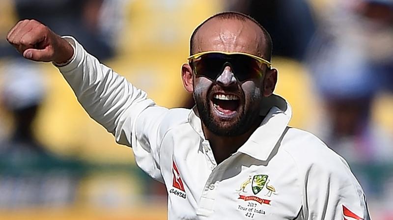 Australia may have failed in their bid to pull off an unlikely victory against India in Adelaide, but Nathan Lyon, who scalped eight wickets in the match, ended the game unbeaten on 38 as he ran out of partners at a venue where he wore overalls as a groundsman eight years ago. (Photo: AFP)