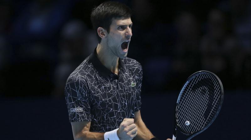 Novak Djokovic, the elastic-limbed 31-year-old, bidding to equal Roger Federers record of six titles at the ATPs blue-riband event, produced an immaculate display to tame American giant John Isner, who was making his tournament debut, 6-4, 6-3. (Photo: AP)