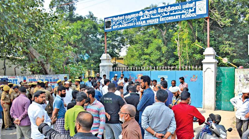 People gathered to protest against the demolition of  Madrasa-E-Azam Higher Secondary School on Anna Salai. (Photo: DC)