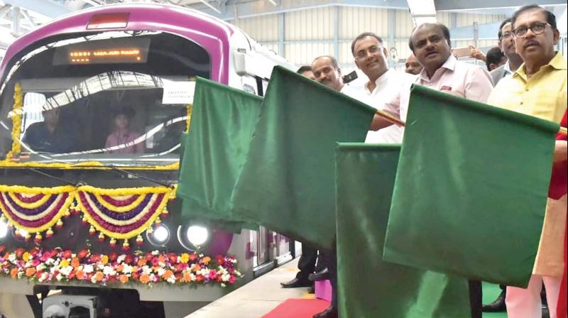 Chief Minister H.D. Kumaraswamy flags off the first six-coach Metro between Yelachenahalli and Nagasandra in Bengaluru on Monday 	(Photo: KPN)