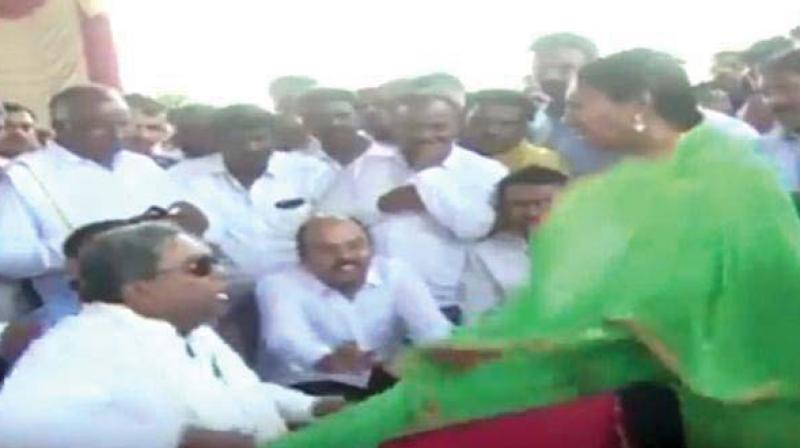 Mr Siddaramaiah was quick to apologise to Ms Jamalar as he flung the womans dupatta back to her.