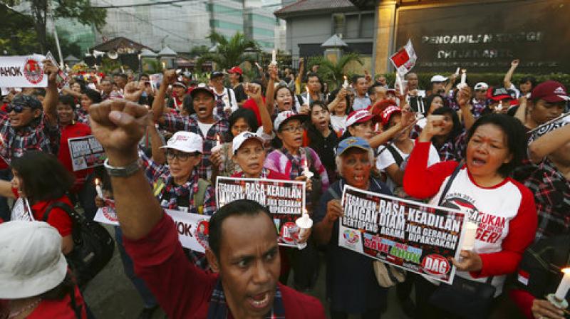 Hundreds of supporters of jailed Christian governor Ahok rally in Indonesia