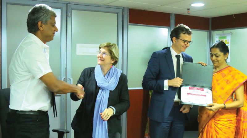 Kochi Metro Rail Limited MD Elias George and Mayor Soumini Jain after receiving the MYC Membership Certificate on Thursday from Annie Guillemot, senator, president of SYTRAL, the Unified Transport Authority of the City of Lyon, France.