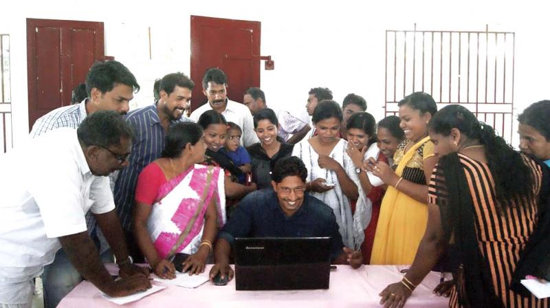 Pizhala residents listen to a trainer at the workshop conducted by St Pauls College, Kalamassery