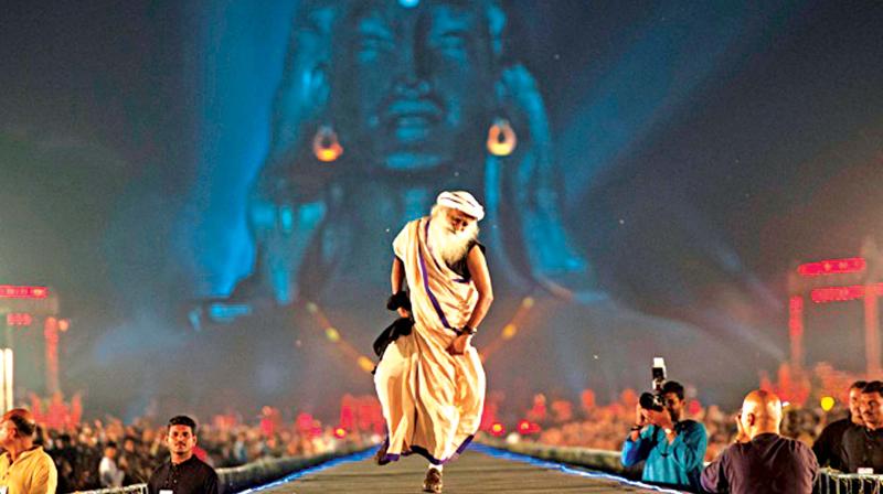 Sadhguru kept his huge audience of followers not just awake but in high spirits by  breaking into dance every now and then through the night of Mahashivaratri at the Isha Yoga Centre near Coimbatore.	(Photo: DC)