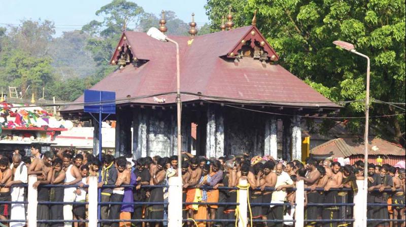 Devotees at Sannidhanam on Friday. (Photo: DC)