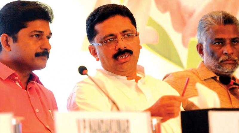 KT Jaleel minister for local administration chat with M Swaraj MLA and John Fernandes MLA during the inauguration of investors meet to promote recycling industries in Kerala as part of extended producers responsibility in Kochi on Friday. (Photo: DC)