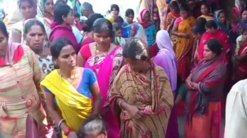 Families of victims wait at the hospital in Muzaffarpur in Bihar on Saturday. (Photo: ANI)