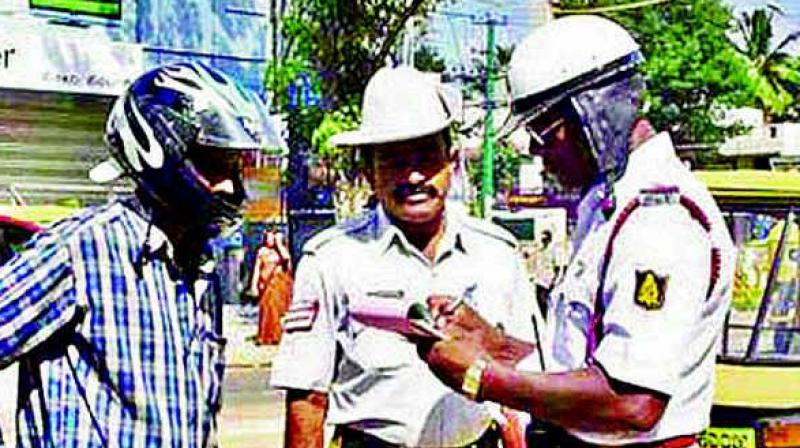 Traffic cops have even slowed down the issuing of spot challans after demonetisation.  (Representational image)