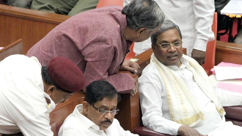 CM Siddaramaiah and Home Minister Dr. G. Parameshwar during the Assembly session at Belagavi on Thursday. (Photo: DC)