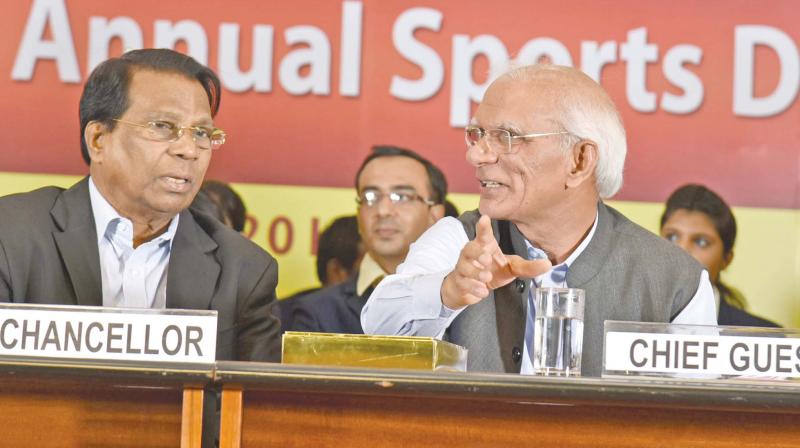 UGC chairman Ved Prakash interacts with VIT Chancellor G.Viswanathan during the VITs university day and annual sports day function in Vellore on Sunday (Photo: DC)