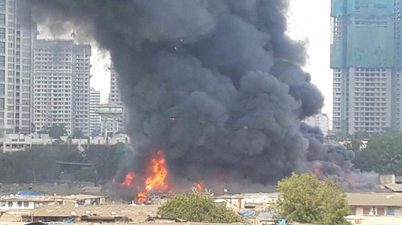 The fire occurred at Gulshan Nagar furniture market in Behraum Baug of Oshiwara area. (Photo: ANI Twitter)