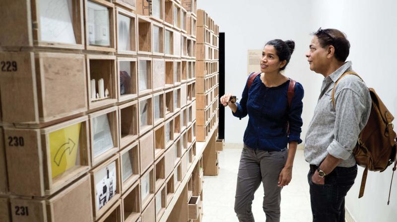 Dilip Kapur viewing Rajeev Thakker installation Home at Aspinwall House, Fort Kochi.