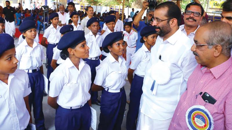 Speaker P. Sreeramakrishnan meets the Customs Cadet Corps at Government Higher Secondary School, Karaparamba on Sunday. (Photo: Viswajith K)