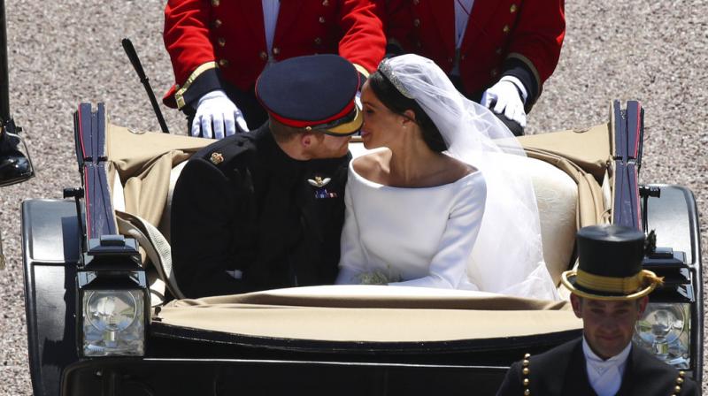 The Duchess official web page comes after it was revealed Meghan and Harry have left Windsor Castle and are heading to London to begin married life together. (Photo: AP)
