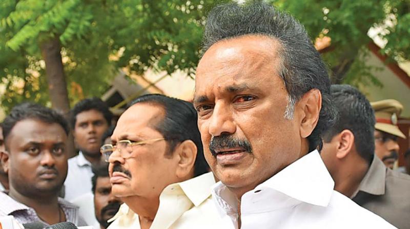 DMK working president and Karunanidhis son M.K. Stalin addresses mediapersons in front of the Gopalapuram residence of his father. (Photo:DC)
