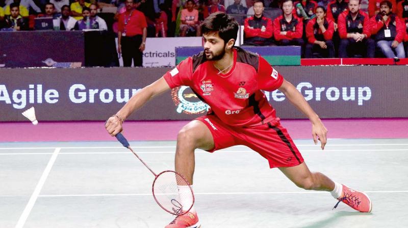 Hyderabad Hunters Sai Praneeth en route to his 10-15, 15-7, 15-14 win over Chong Wei Feng of Bengaluru Blasters in their PBL match in Hyderabad on Thursday.