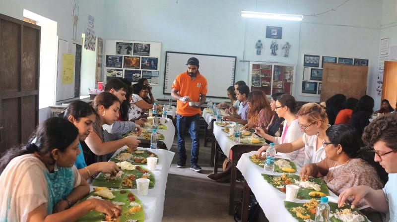 The team from the Steinhardt Institute for Higher Education Policy, New York University who visited the HHMSBP NSS College for Women, Neeramankara, Thiruvananthapuram having a traditional Kerala lunch.