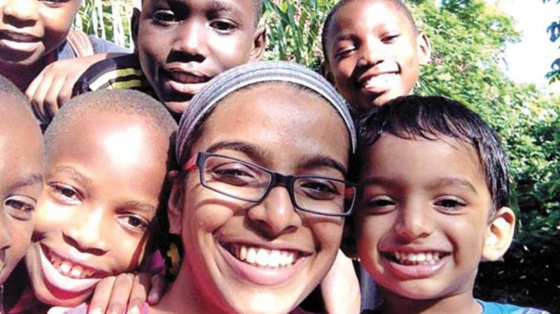 Somy Solomon with her son and children of Kichankani village.