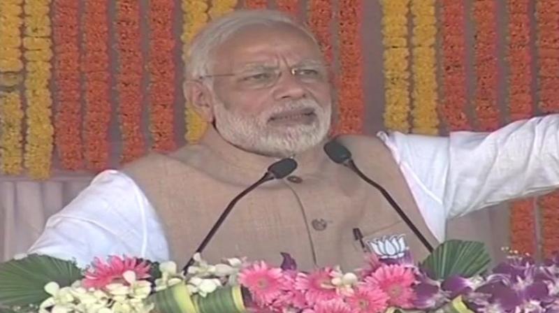 PM Modi urged the people to teach a fitting lesson to the Congress leaders. (Photo: ANI/Twitter)