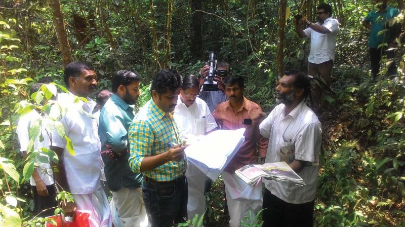 Kerala Congress chairman P.C. Thomas and team examine the land at Kanjirangadu, Vellamunda, Wayanad on Tuesday.