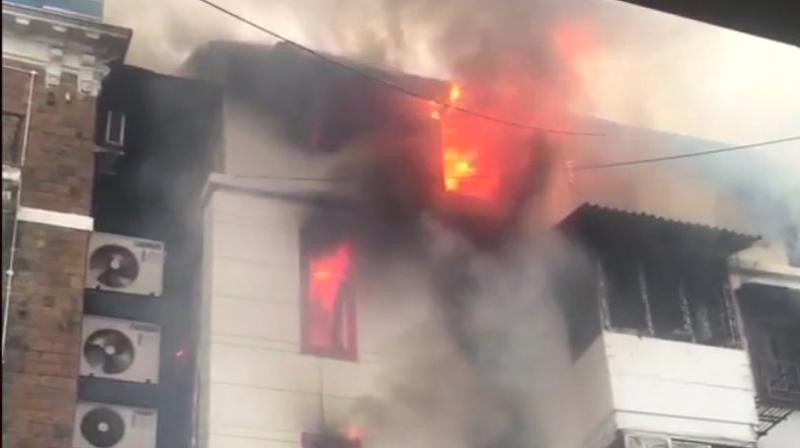 The fire erupted on the top floor of Girgaons Kothari House building in South Mumbai on Sunday evening. (Photo: ANI/Twitter)