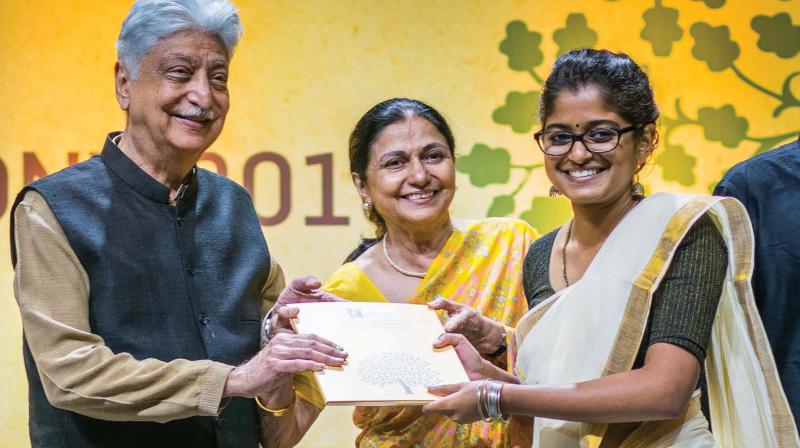 Founder Azim Premji presents a degree to a student at the sixth  convocation ceremony at Azim Premji University on Saturday 	 (Image: DC)