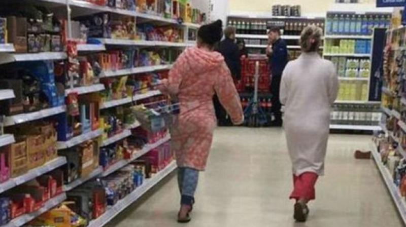 The pair caused a stir after a fellow customer complained about their attire to Tesco, branding it \bloody disgusting\. (Photo: Facebook)