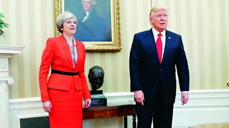 President Donald Trump meets with British Prime Minister Theresa May on Friday. (Photo: AP)