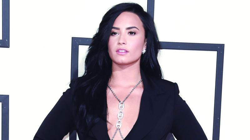 Lovato, who bought the four-bedroom home, had not yet moved in.