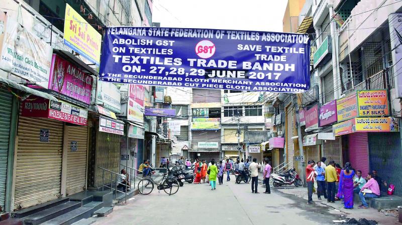 Textile shops down shutters in protest against GST in Secunderabad for the second day on Wednesday. (Photo: DC)