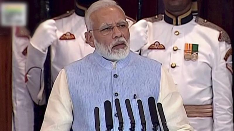 Prime Minister Narendra Modi addresses the special ceremony in the Central Hall of Parliament for the launch of Goods and Services Tax (GST), in New Delhi on Saturday. The GST comes into effect on Saturday after the midnight. (Photo: PTI)