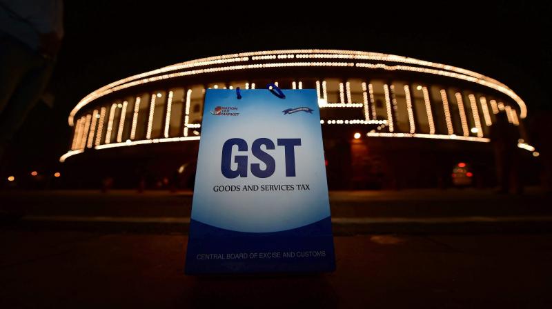 An illuminated Parliament ahead of midinight launch of Goods and Services Tax (GST) in New Delhi on Friday. (Photo: PTI)